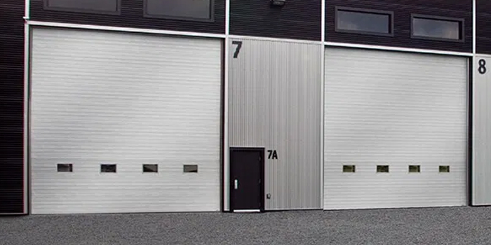 fix bent garage door in Delta