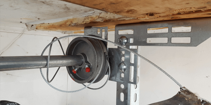 Lander fix garage door cable